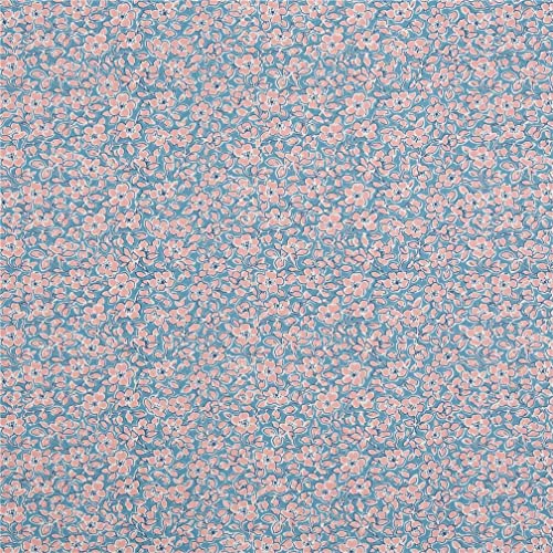 Tela de Liberty Fabrics floral Chatsworth Blossom de la colección Spring Flower Show con tupidas flores rosas sobre fondo azul