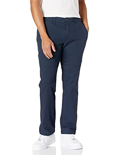 Amazon Essentials - Pantalones chinos elásticos informales de corte atlético, Marino, 33W x 28L