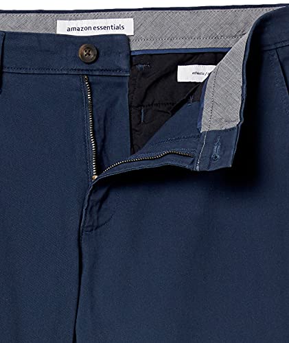 Amazon Essentials - Pantalones chinos elásticos informales de corte atlético, Marino, 33W x 28L